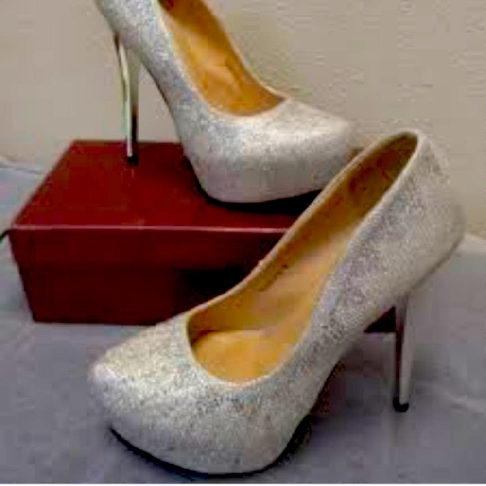 Never Worn these heels they are still brand new still in The original box